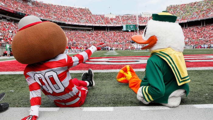 The Ohio State and Oregon mascots take in Saturday's game in Columbus